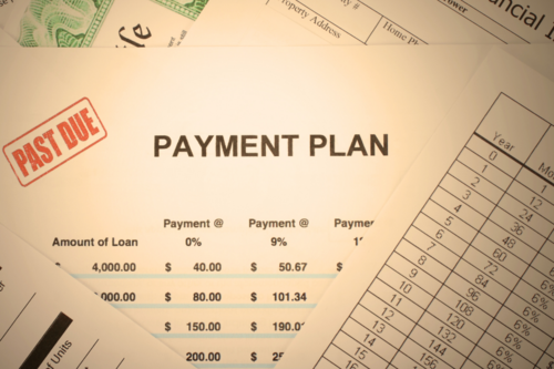 An image of a paper that says "Payment Plan," with a red stamp that says "Past Due."