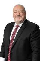 A photo of Richard Muller, Michigan bill collector.