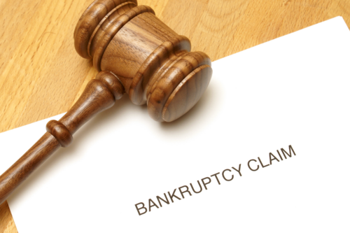 Photo of a Bankruptcy Claim Form with a gavel.
